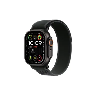 A black digital sports watch with a woven loop strap on a white surface